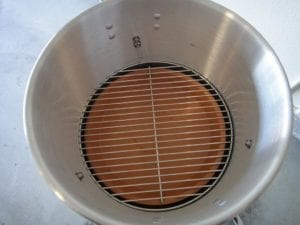 View into Mini WSM of bottom cooking grate