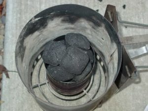 20 briquettes in a bottomless coffee can inside a chimney starter