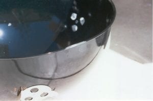 Damaged charcoal bowl edge