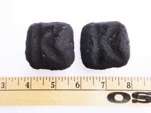 Front view of 2014 Kingsford (left) and 2015 Kingsford (right). Briquets continue to feature the "K" imprint on the front.