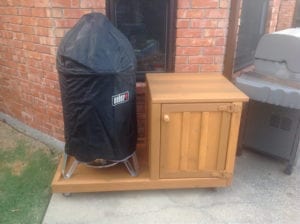 Wooden WSM platform with storage cabinet