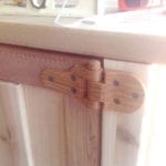 Wooden hinges installed