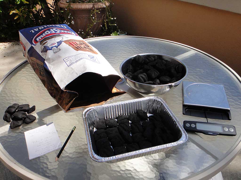 Counting out and weighing 100 briquets for the burn test.