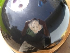 Damaged lid finish after dent removal