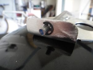 Close-up of damper handle with e-clip fastener