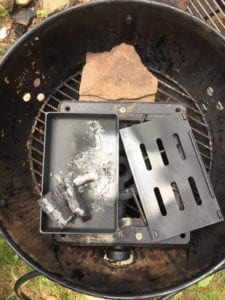 Smoker box on top of cast iron stove