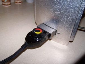 Thermostat plugged into electric element