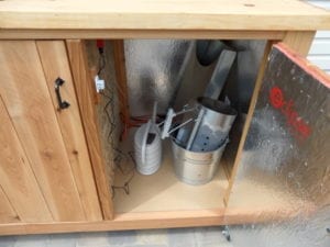 Accessory storage on the right side of enclosure