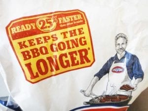 Many individual (non-twin pak) bags of 2015 formula Kingsford Charcoal Briquets carry this bright yellow and red advertising claim.