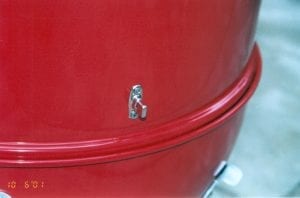 Turn button mounted on cooking section