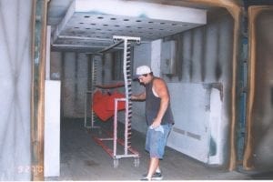 Parts go into the curing oven