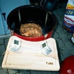 Pork butt goes onto the lower grate
