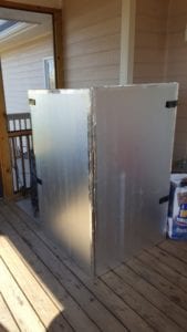 Aluminum-covered foam windbreak in closed position
