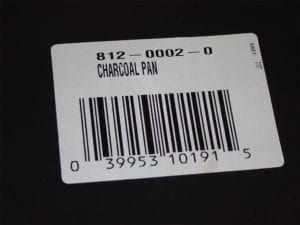 Close-up of Brinkmann charcoal pan retail part number and UPC code