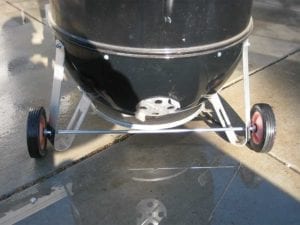 Close-up of wheels and axle