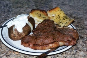 Porterhouse grilled on the WSM