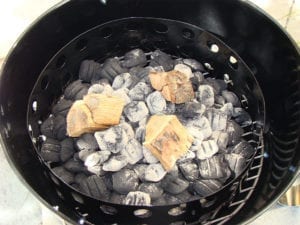Smoke wood place on hot coals