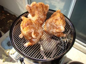 Overhead view of 6 chickens in cooker