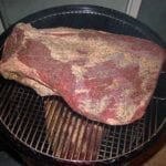 Two 15-pound briskets go into the 22" WSM