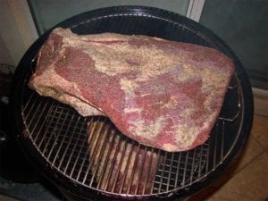 Two 15-pound briskets go into the 22" WSM