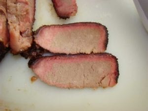 Close-up of smoke ring on brisket slices