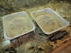 Weighing ashes on an electronic kitchen scale.