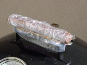 Wooden lid handle covered with sandwich bag