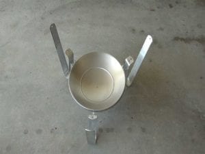 Leg/heat shield assembly ready to receive charcoal bowl