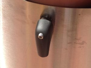 Repaired oblong access door handle