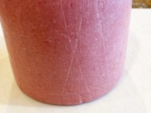 Close-up of scored bologna