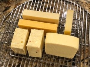 Arranging cheese blocks on wire rack