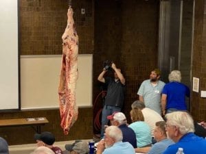 Side of beef rolls into the classroom