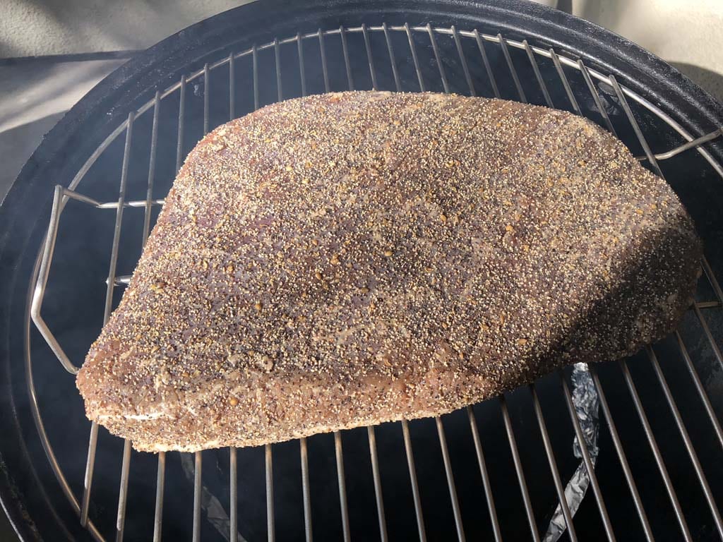 Cured brisket goes into the WSM