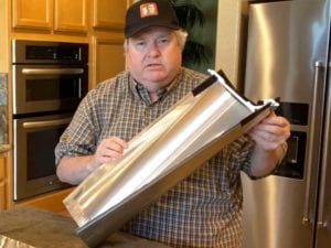 Charcoal chute using split aluminum duct