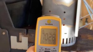 Measuring Kingsford Briquets 1984 charcoal chimney temperature with an infrared thermometer