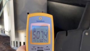 Measuring Kingsford Briquets 2020 temperature with an infrared thermometer