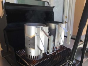 Charcoal chimneys over foil pans