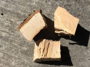 Three fist-sized chunks of apple smoke wood