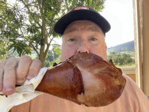 Chris Allingham holding a giant Texas turkey leg