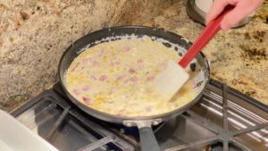 Cheesy corn mixture after 8 to 10 minutes of cooking