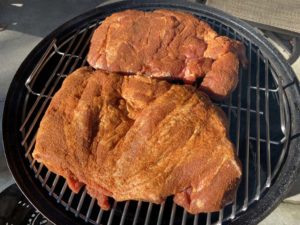 Split pork butt goes into the WSM