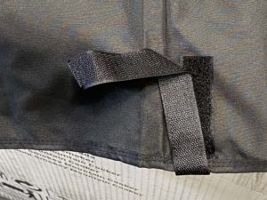 Velcro leg strap secures cover to grill