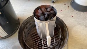 Lighting charcoal in a chimney starter