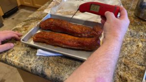 Temping pork tenderloins in the kitchen