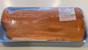Side of wild-caught King salmon in packaging