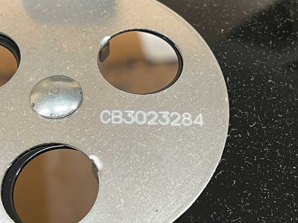 Serial number engraved on lid damper